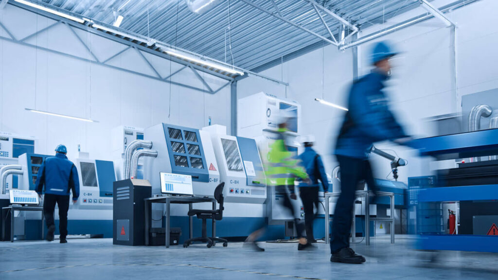 Blurred Motion Shot of a Team of Engineers Professionals and Workers