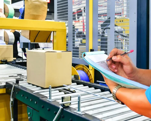 Asiapack blog warehouse worker checking off items in an assembly service jpg